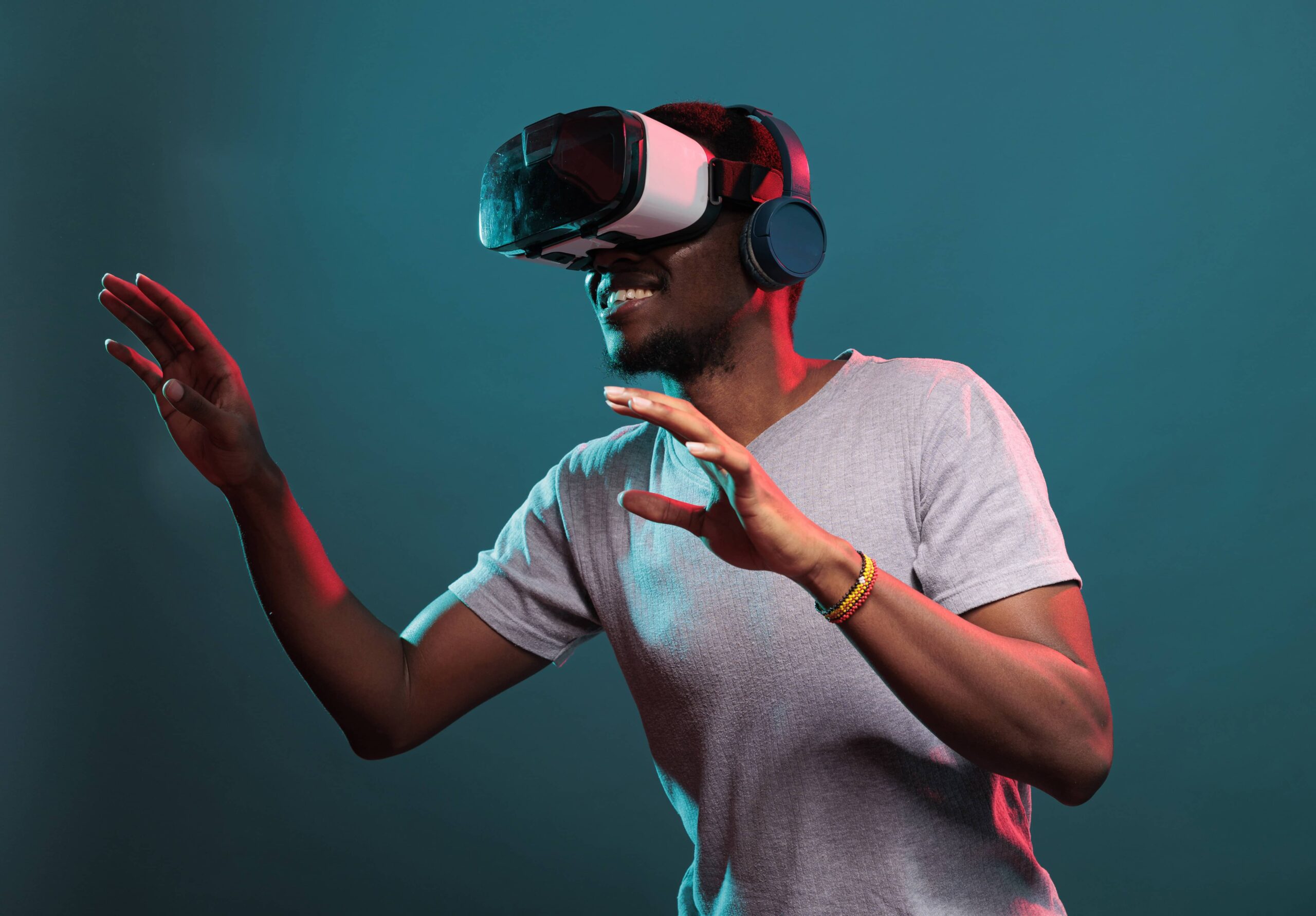 smiling-model-playing-virtual-game-interactive-vr-goggles-having-fun-with-modern-3d-technology-person-using-futuristic-device-with-visual-simulation-tech-innovation-leisure-activity